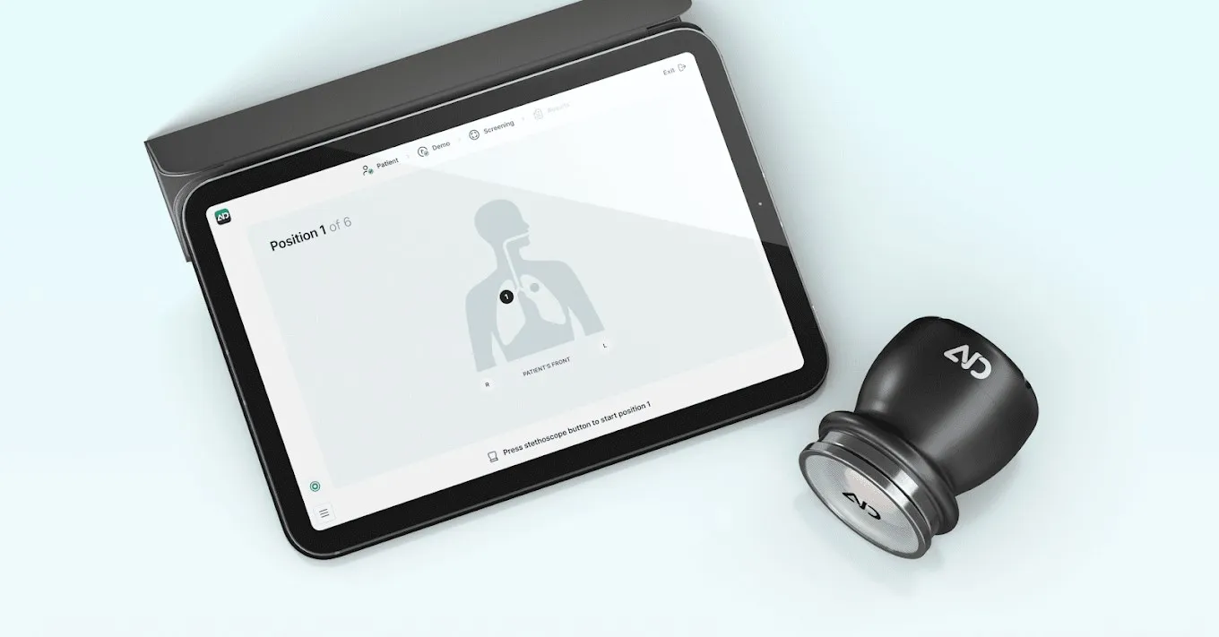 The AI Diagnostics digital stethoscope beside a tablet running a screening